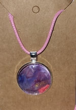 Thumbnail: Multiple necklaces on faux suede