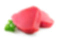 Fresh tuna fish fillet steaks garnished with parsley isolated on white background.jpg