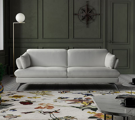 Italian grey sofa with framing walls