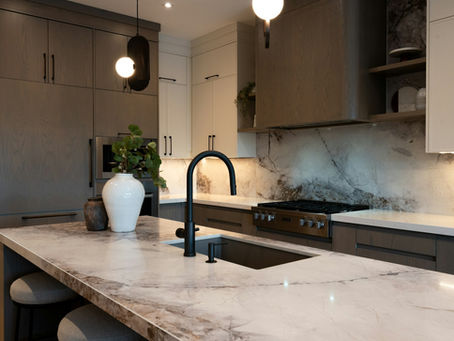 Luxury Italian kitchen in a London home with marble island and bespoke cabinetry