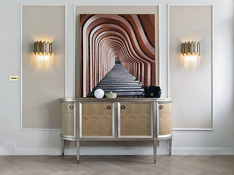 sideboard with a colour artwork and famed walls