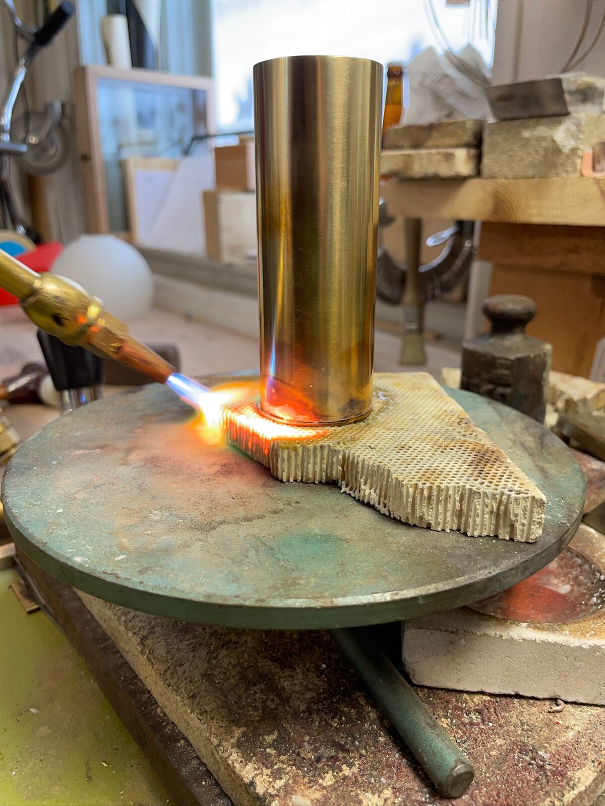 Soldering the brass tube with the torch