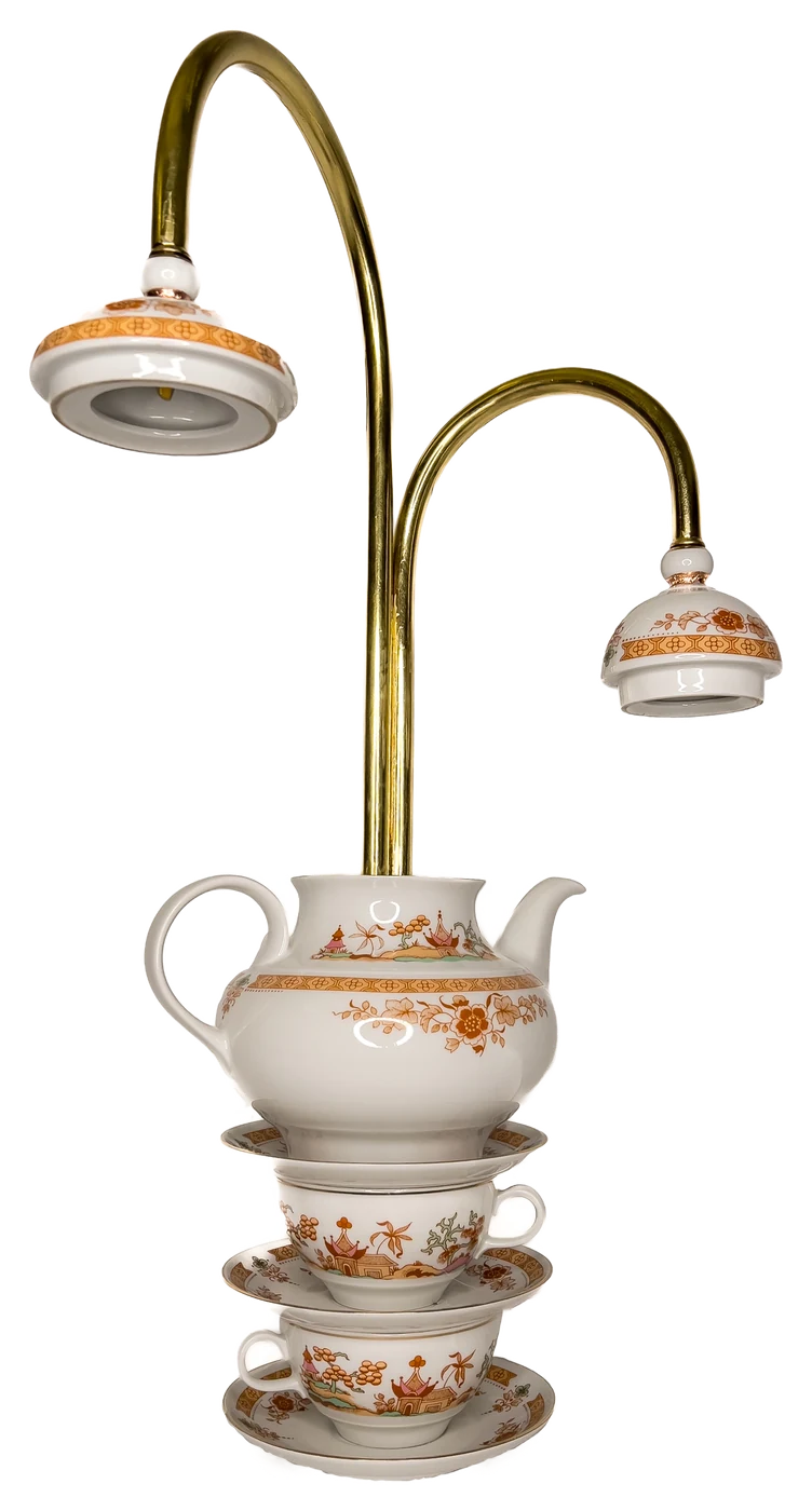 Porcelain Teapot Lamp, Once a porcelain teapot and cups, now a table lamp.