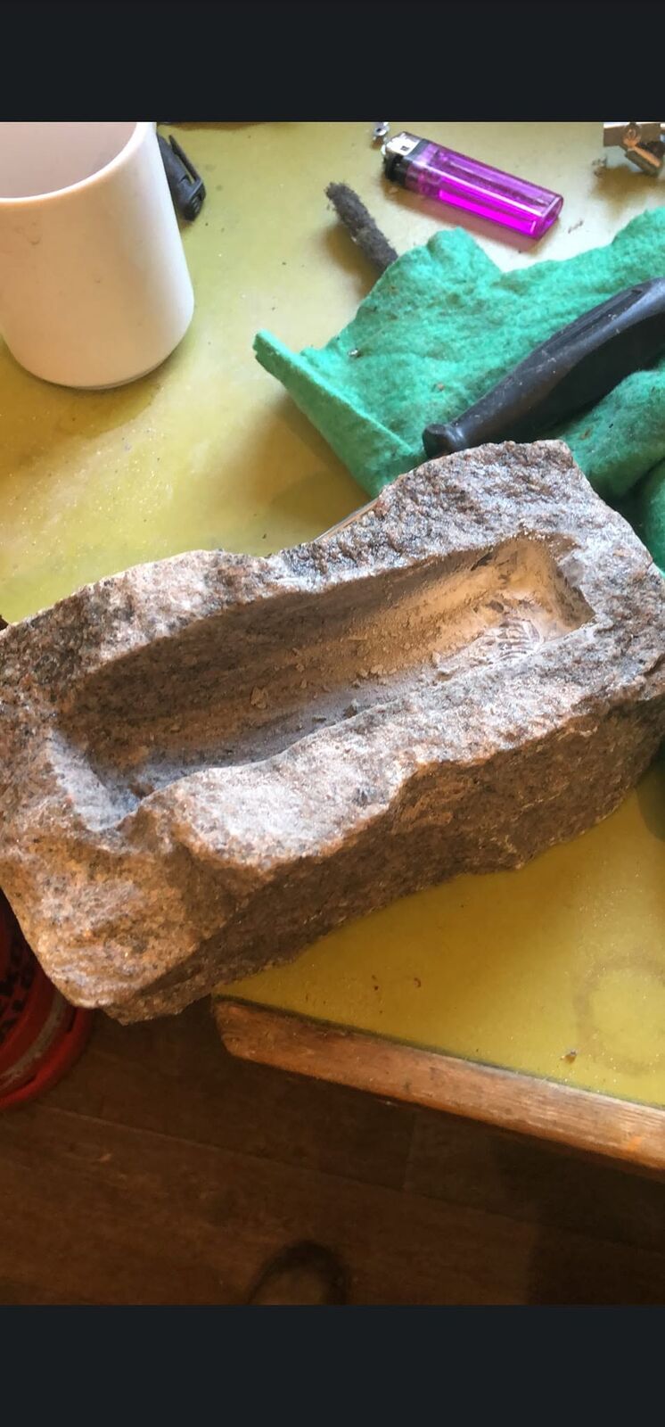 The granite, on the bench.