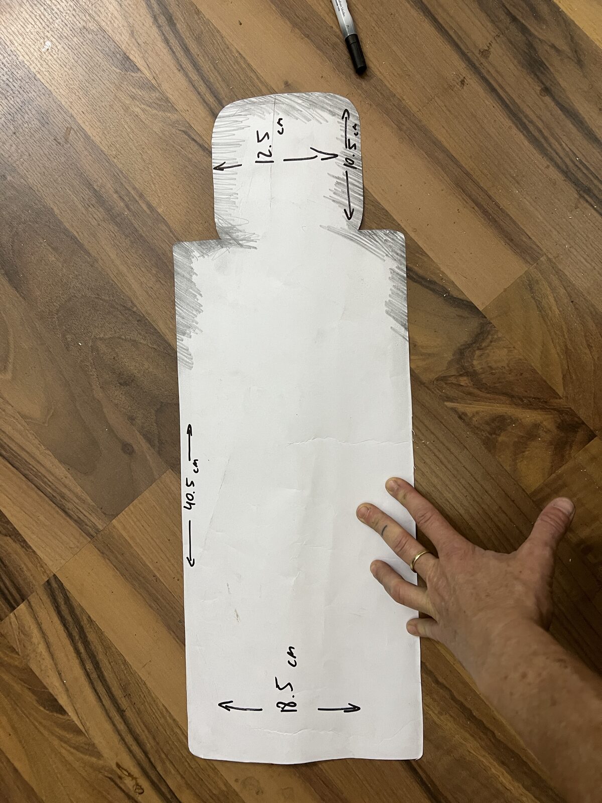 Paper template with measurements, Keren's hand