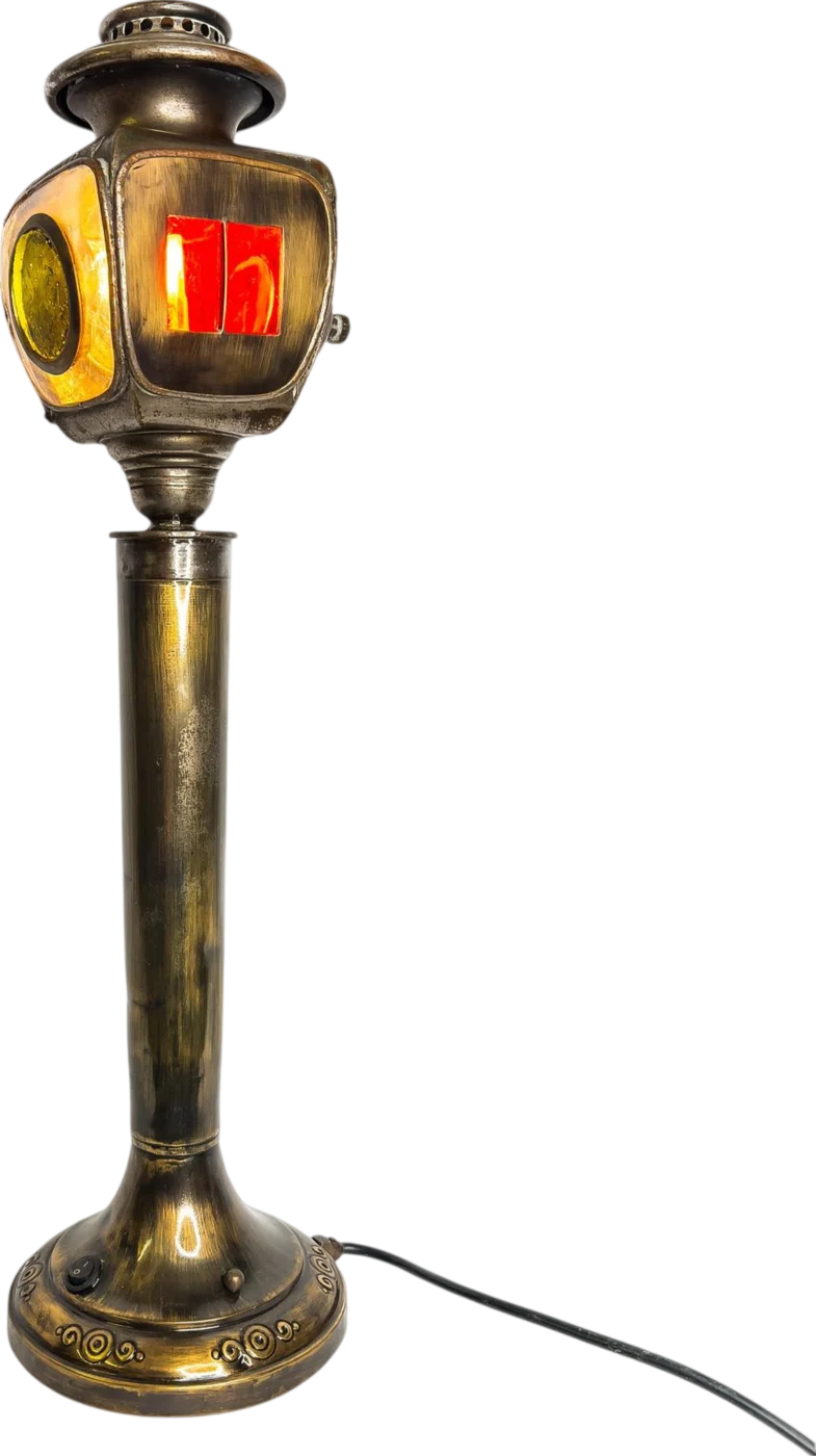 Parisian Lamp Post, Once an oil lamp, a shell casing and a carriage light, now a table lamp.