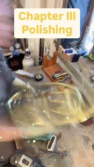 Polishing the tuba at the bench