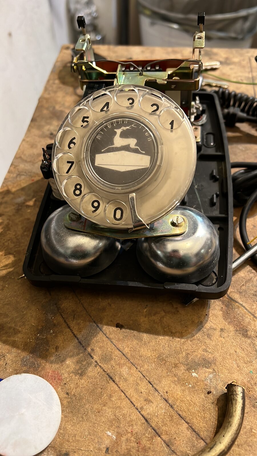 Phone opened: dial and bells on the bench