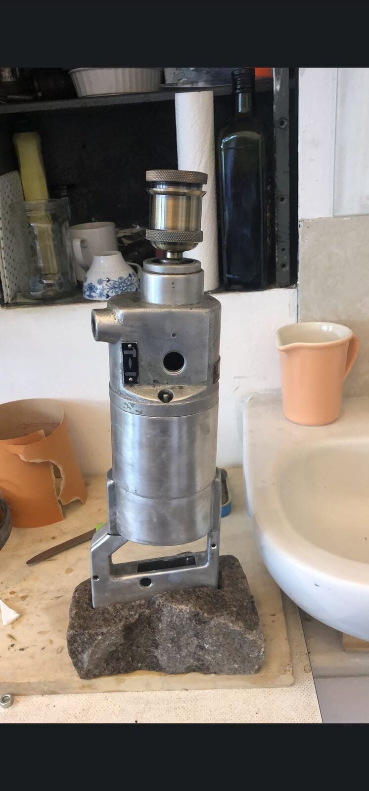 The East German drill standing on its granite base in the studio