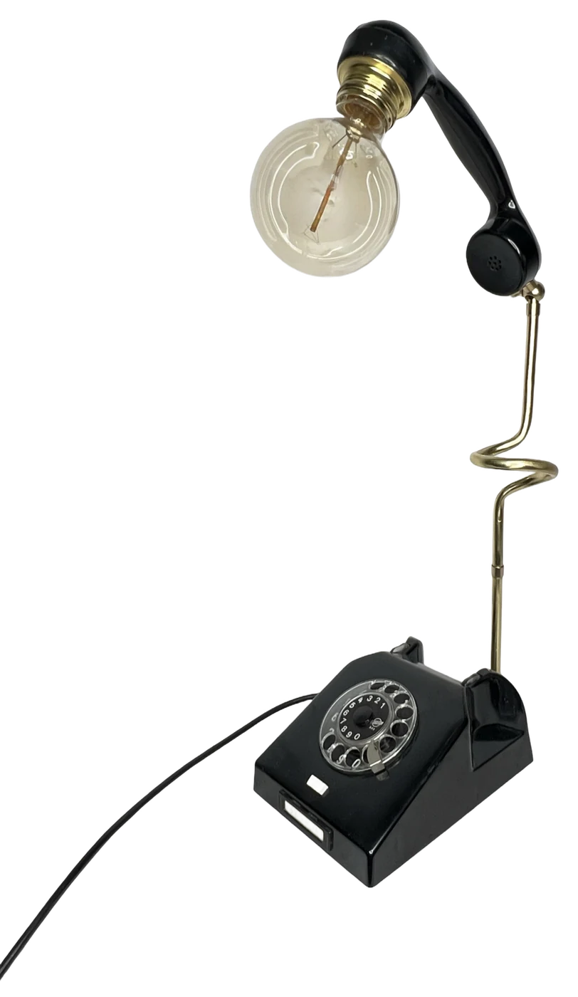 Black Phone Tornado, Once a black telephone, now a table lamp.