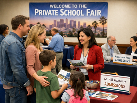 A family at a school admissions fair interacts with staff. Booths for private schools are visible. 