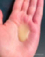 Some By Mi Bye Bye Blemish Vita Tox Brightening Bubble Cleanser in palm of the hand