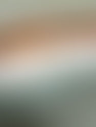 White pillows on a wooden bed with teal bedding. Text reads "SLEEP & GLOW: Omnia vs Aula pillows." Calm, neutral setting.