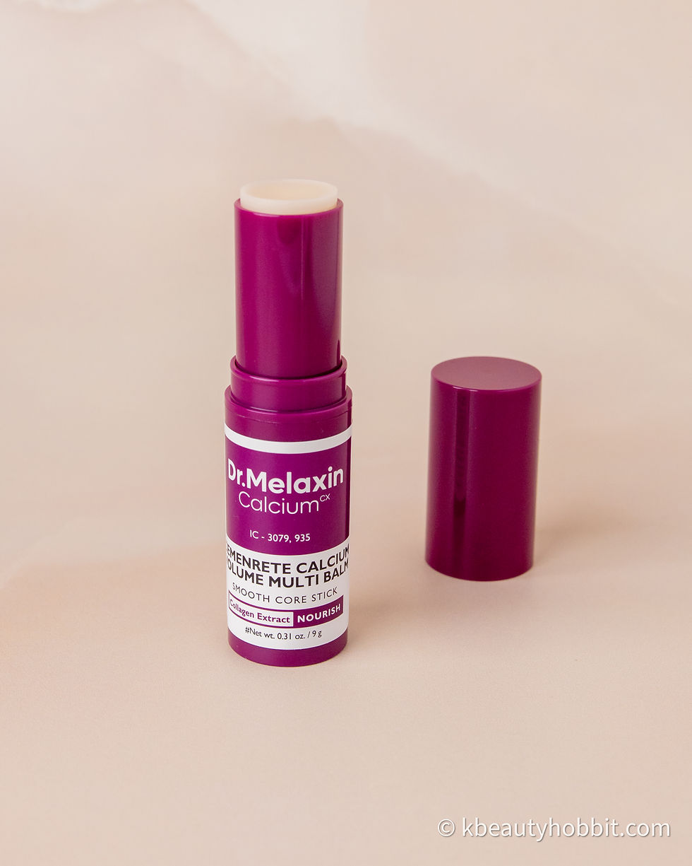 A purple tube of Dr. Melaxin Calcium Volume Multi Balm is open with the cap beside it on a beige background. Text visible on the label.