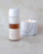 Dr Ceuracle Kombucha Essence next to a candle