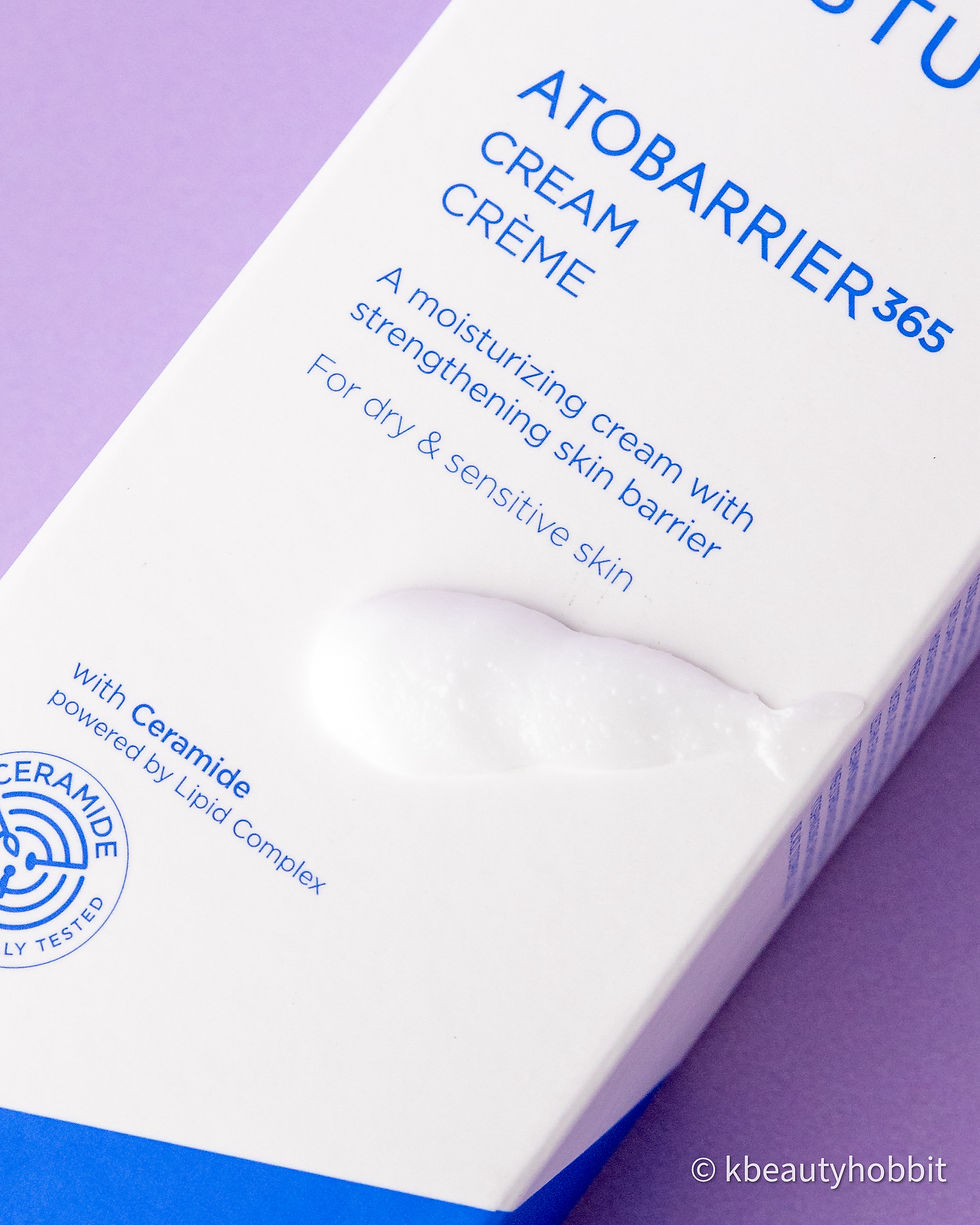 Aestura Atobarrier 365 cream tube on a purple background, with blue text about moisturizing and strengthening skin barrier
