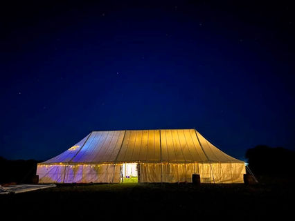 Our 12x30-metre wooden pole marquee is perfect for events