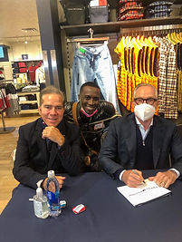 Jordan Brooks aka lacedbylacroix with fashion designers Andy, left, and Tommy Hilfiger.jpg