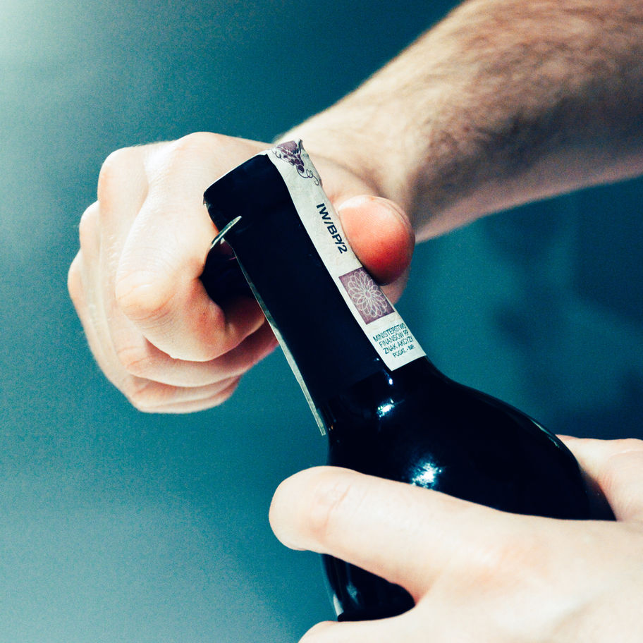Opening wine bottle for Everyday Elevated Wine Tasting Ticket