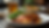 Eye-level view of grilled chicken served with a side of vegetables