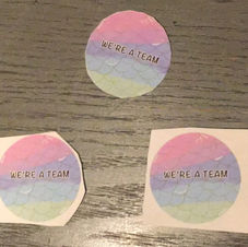 WE'RE A TEAM STICKERS.jpg