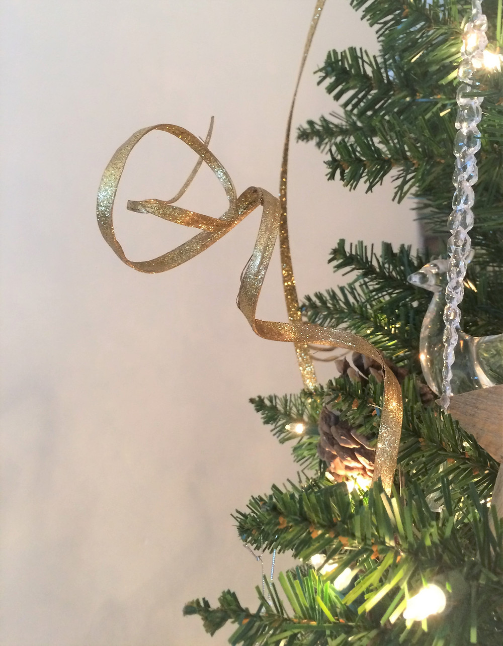 glitter and gold picks on a Christmas tree
