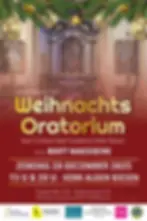 The Bach Academy choir sings under soft lighting in the church of Alden Biesen during the annual Christmas concert.