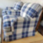 Armchairs recovered in blue check fabric