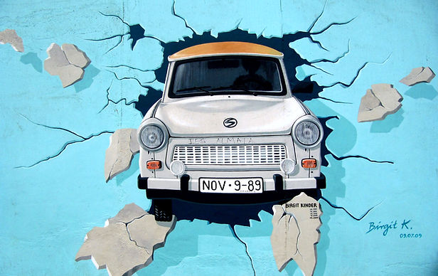 Car Through Wall Graffiti
