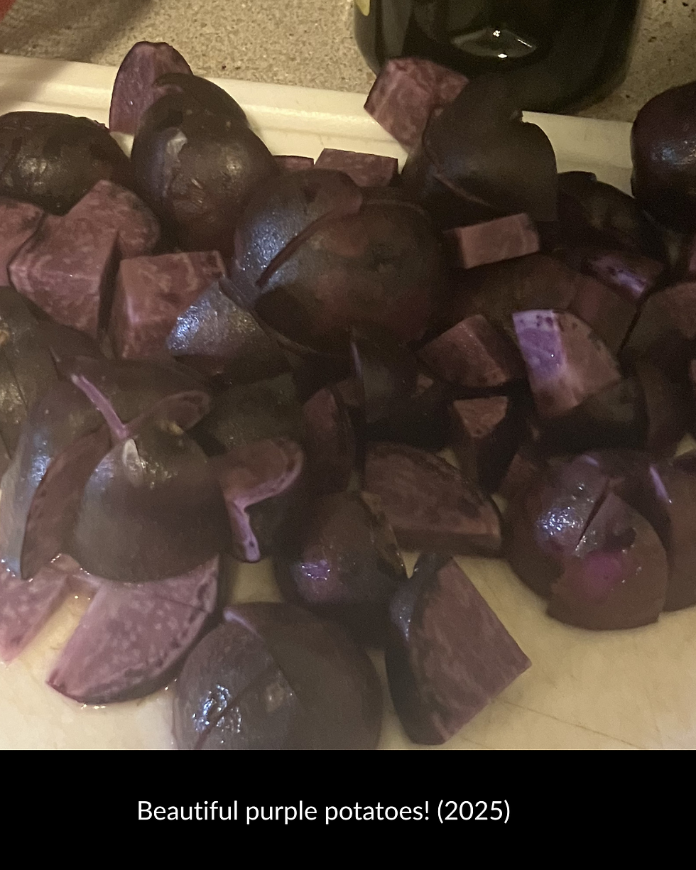 Cut purple potatoes piled on a cutting board in a kitchen, with caption Beautiful purple potatoes! (2025).