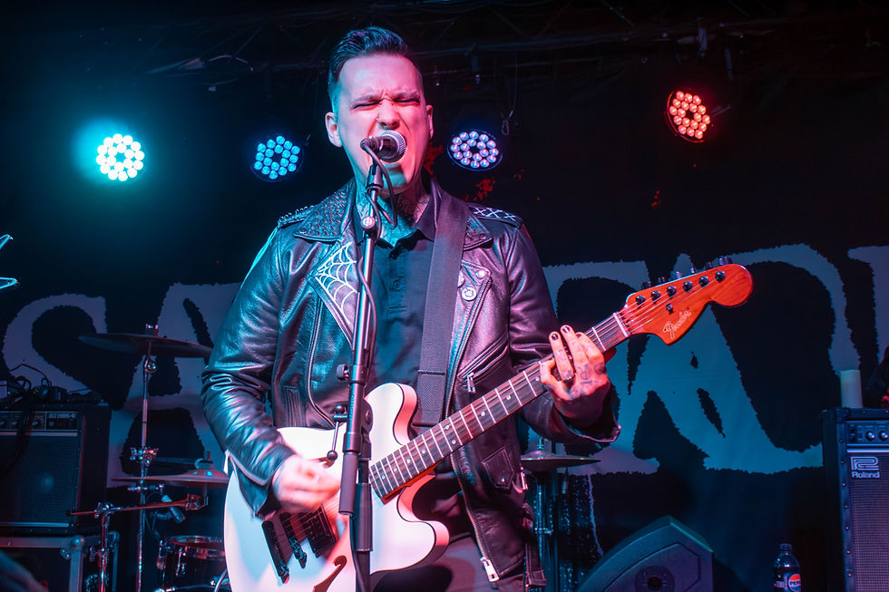 A photo of Midnight Feature performing on stage