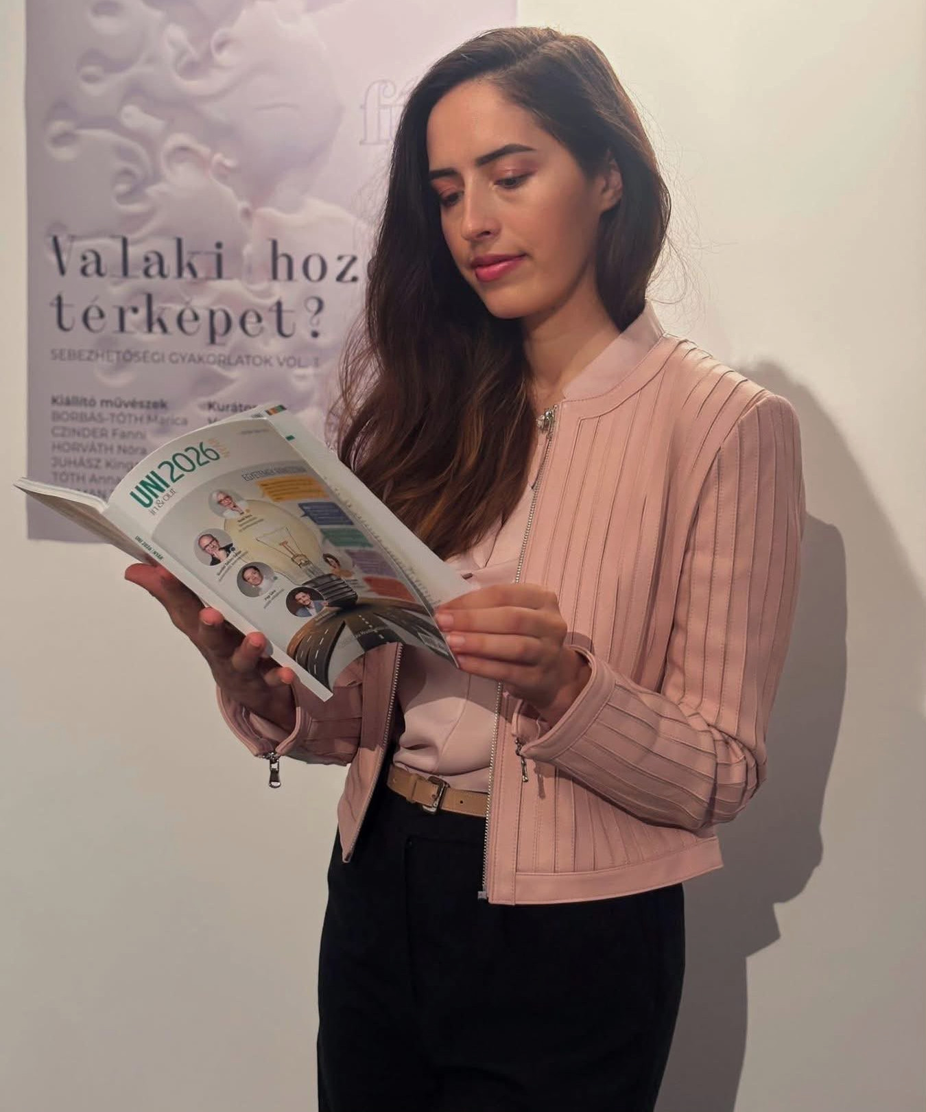 Antonia Bai reading a book, she is an interpersonal and intercultural psychologist.