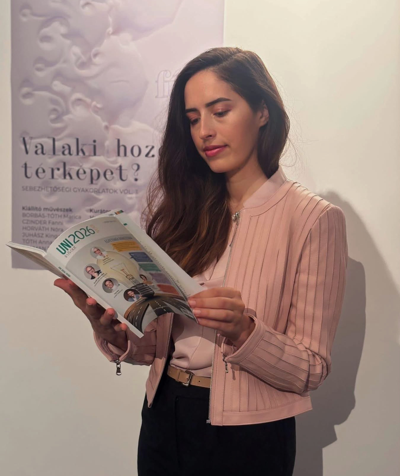 Antonia Bai reading a book, she is an interpersonal and intercultural psychologist.