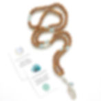 mala bead necklace with sandalwood, moonstone, aquamarine and sterling silver feather pendant