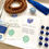 Thumbnail: mala making kit including all the materials: sandalwood or rudraksha and lapis lazuli beads, thread, guru bead & blue tassel