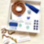 Throat Chakra mala making kit including all the materials: sandalwood or rudraksha beads, thread, guru bead and tassel