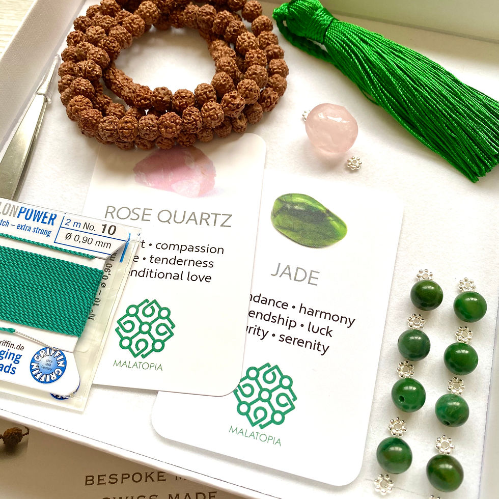 Thumbnail: mala making kit including all the materials: sandalwood or rudraksha and jade beads, thread, guru bead and green tassel
