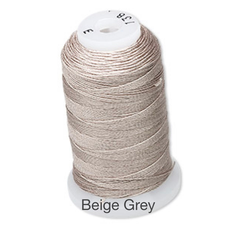 Thumbnail: spool of grey coloured silk thread size E