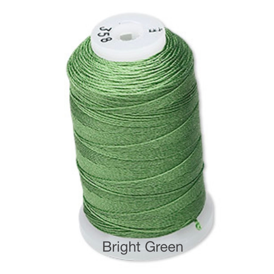 Thumbnail: spool of bright green coloured silk thread size E