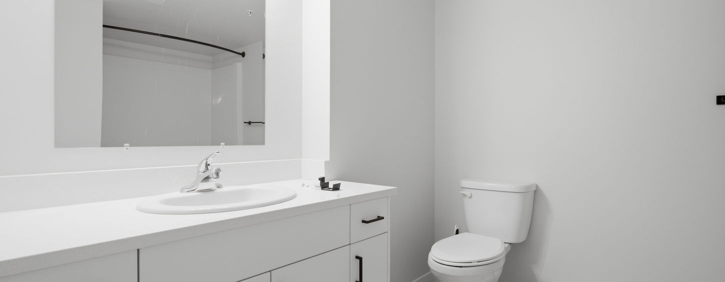 Full bathroom with vanity and tiled floor in a College Station one-bedroom suite