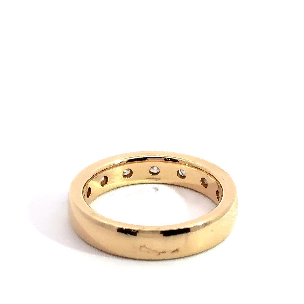 Thumbnail: Round & Baguette Channel Set Wedding Band