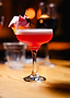 A cocktail served at the bar in the vault, with an origami garnish