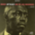 Black-and-white album cover for Moanin’, featuring a close-up portrait of jazz drummer Art Blakey with bold blue typography.