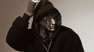 Mk.gee in a hoodie
