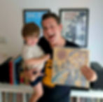 Matt Jones and son Aussie show off their Midnight Oil record.