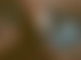 Sydney alt-pop artist Jordan Laser sitting next to a pool looking pensive