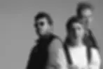 Cocteau Twins posing for a promo photo in 1990