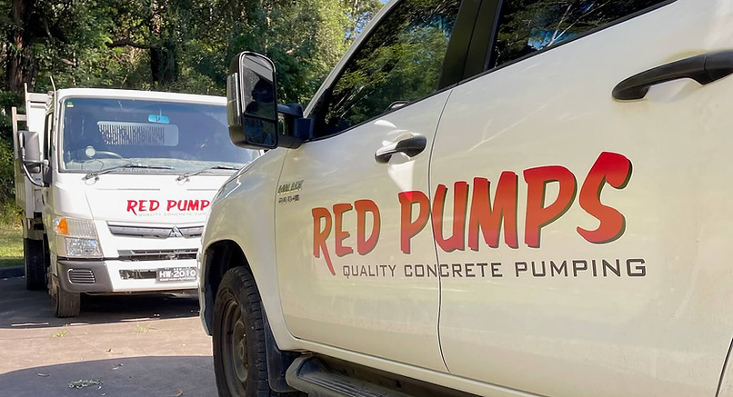 Red and black Red Pumps logo on a white ute and truck