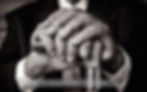 Thumbnail: The hands of Sir Hardy Amies resting on his walking stick by Tim Booth