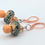 Thumbnail: Orange Cream Dangle Earrings